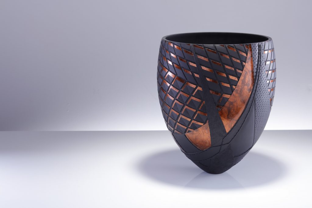 A wooden sculpture by Sally Burnett will be on display at the Lexus Takumi Townhouse during London Craft Week
