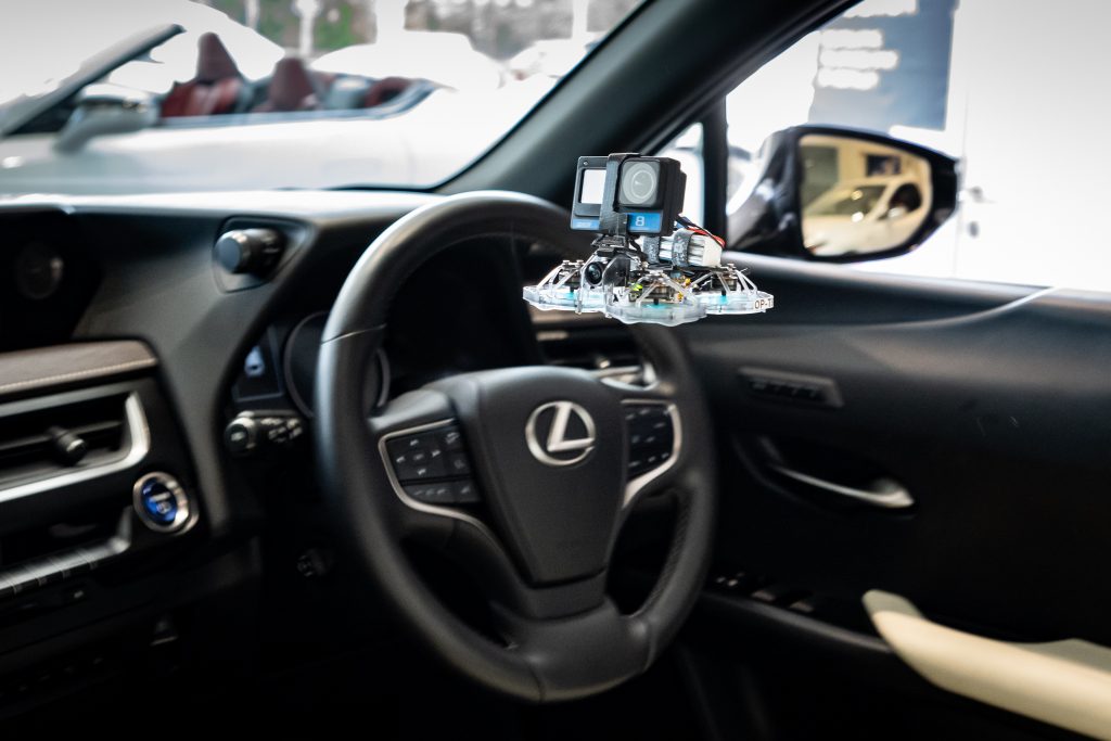 Custom-made drone flying through a car at the Lexus Hedge End dealership