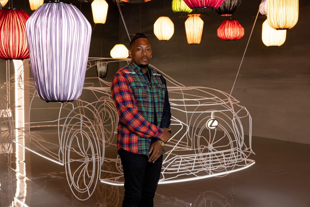 Germane Barnes with the Lexus RZ rendered in a suspended wire frame