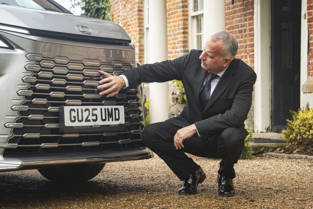 Chauffeur Rob Mitchelmore carries out pre-journey safety checks including checking the bodywork for any wear and tear