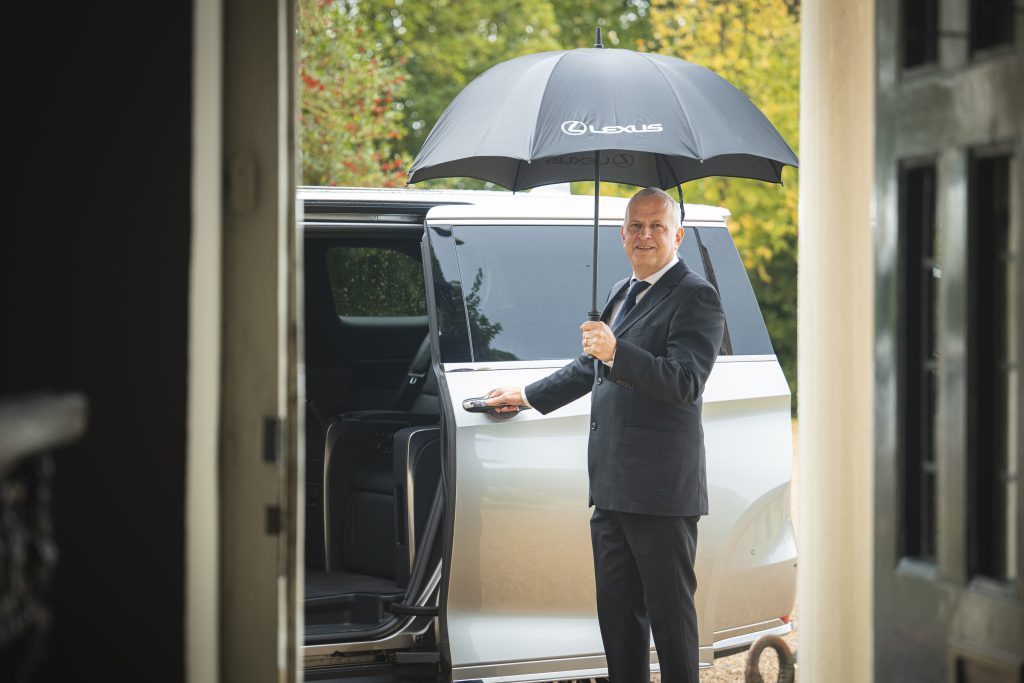 Top chauffeur, Rob Mitchelmore with the Lexus LM at The Castle Westenhanger in Kent