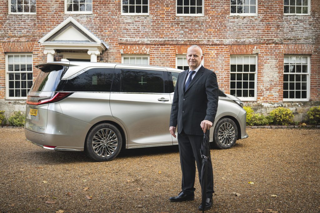 Top chauffeur, Rob Mitchelmore with the Lexus LM at The Castle Westenhanger in Kent